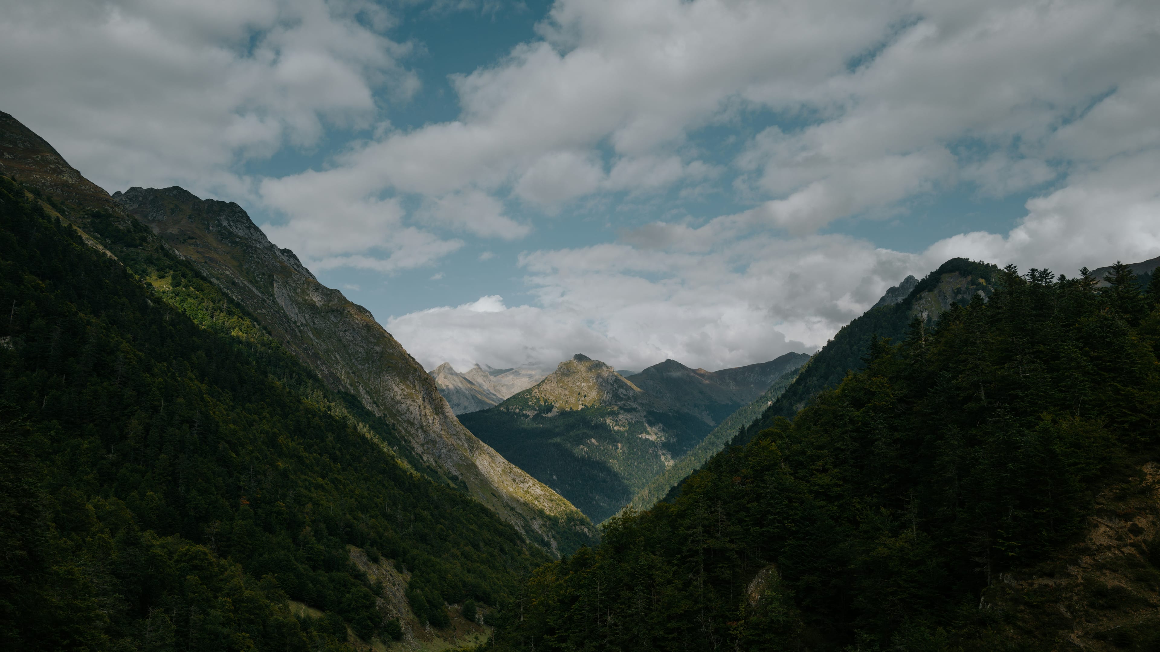 A mountain valley beneath an open sky